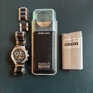Swatch Watch women’s Irony Chrono Black and silver Watch. Needs new battery.